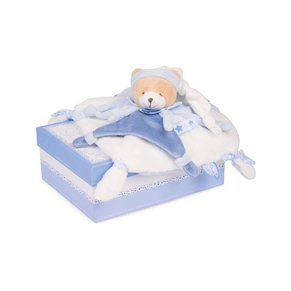 Blue and white bear plush toy on gift box