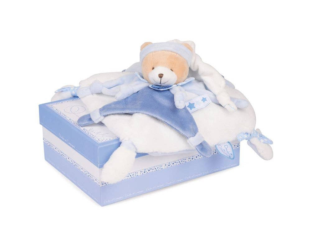 Blue and white bear plush toy on gift box