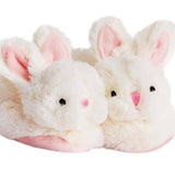 Soft pink bunny slippers for babies with rattle feature