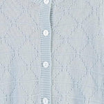 Knitted cardigan, stitch and button detail
