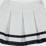 Piccola Speranza White male skirt with pattern and navy blue ribbon