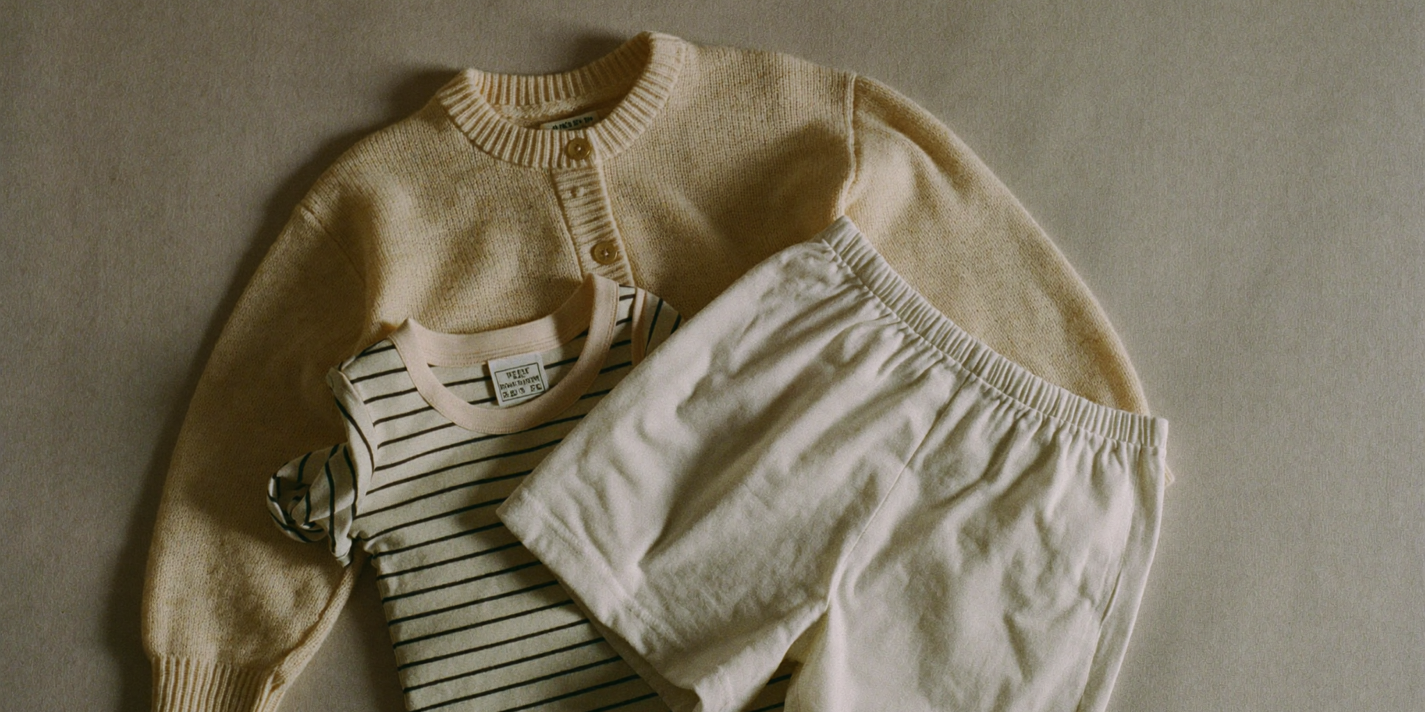 Folded kids cardigan, striped tee and cotton shorts