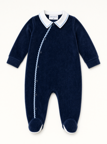 Bebe Sweeny navy velour babygrow with white collar and light blue ric-rac trim, front view
