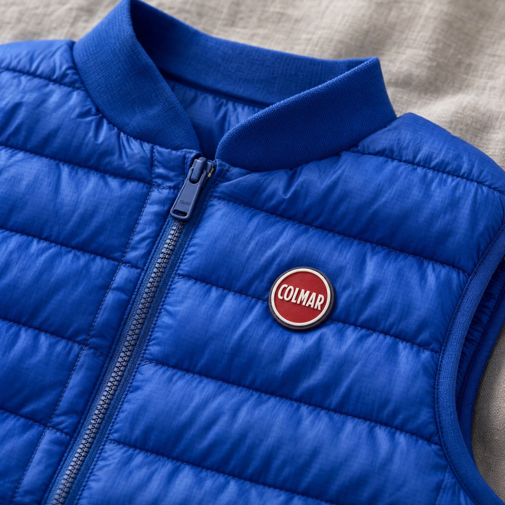 quilted-vest-bright-blue-colmar detail